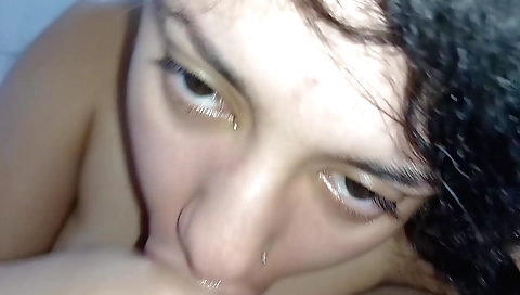 A brunette girl is making out in her bedroom and getting cum