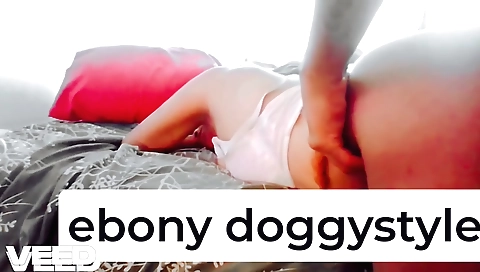 Indian brunette yoga instructor in a hot yoga pose