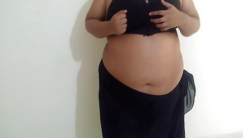 Indian beauty is doing deep breathing in front of her webcam