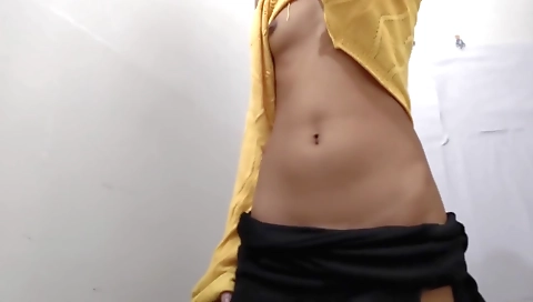 Indian girl with beautiful body spreads her legs on the bed