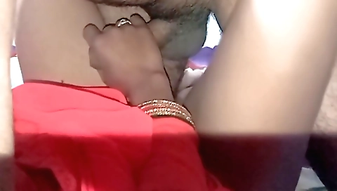 Indian babe with hairy bush giving a handjob on penis