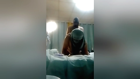 Mature brunette with a shaved pussy fucks on a webcam