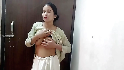 Indian beauty plays with a toy and does not know what she is doing