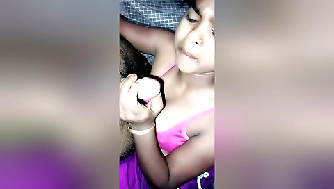 Amateur redhead with a large natural tits giving blowjob