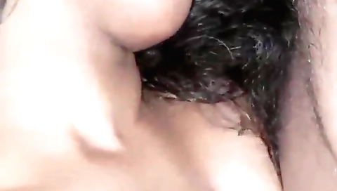 Brunette beauty with a sexy face is having a facial