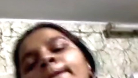 Brunette girl shows her large boobs on webcam video