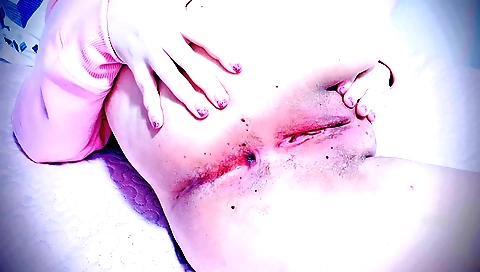 Indian chick in a sexy dress and stockings masturbates