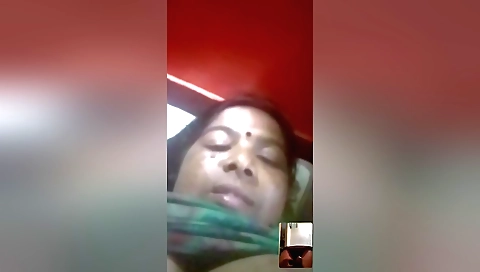 Indian chick in a black t-shirt is getting cum on his dick