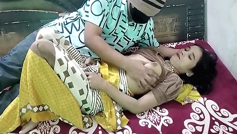 Indian teen girl is having fun on the kitchen table