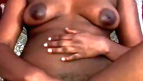 Sexy brunette chick with hairy pussy playing with it