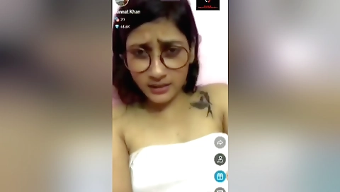 A teen brunette gets naked on webcam and shows her body