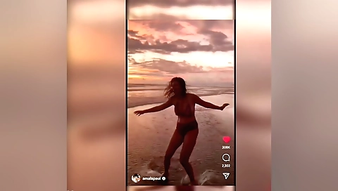 Busty brunette in outdoor is naked and shows off her body