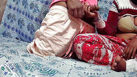 Big boobs girl is giving a handjob in front of the camera