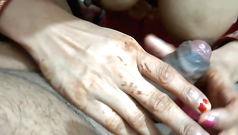 Indian girl in red is getting whipped up by a dude