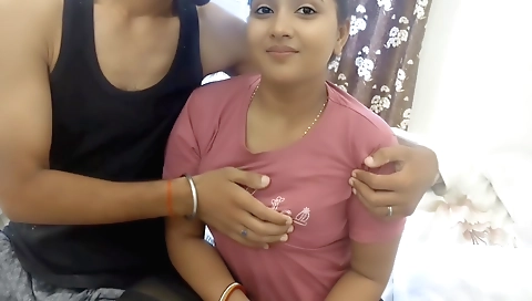 A brunette in a hot room shows her small body and a juicy pussy